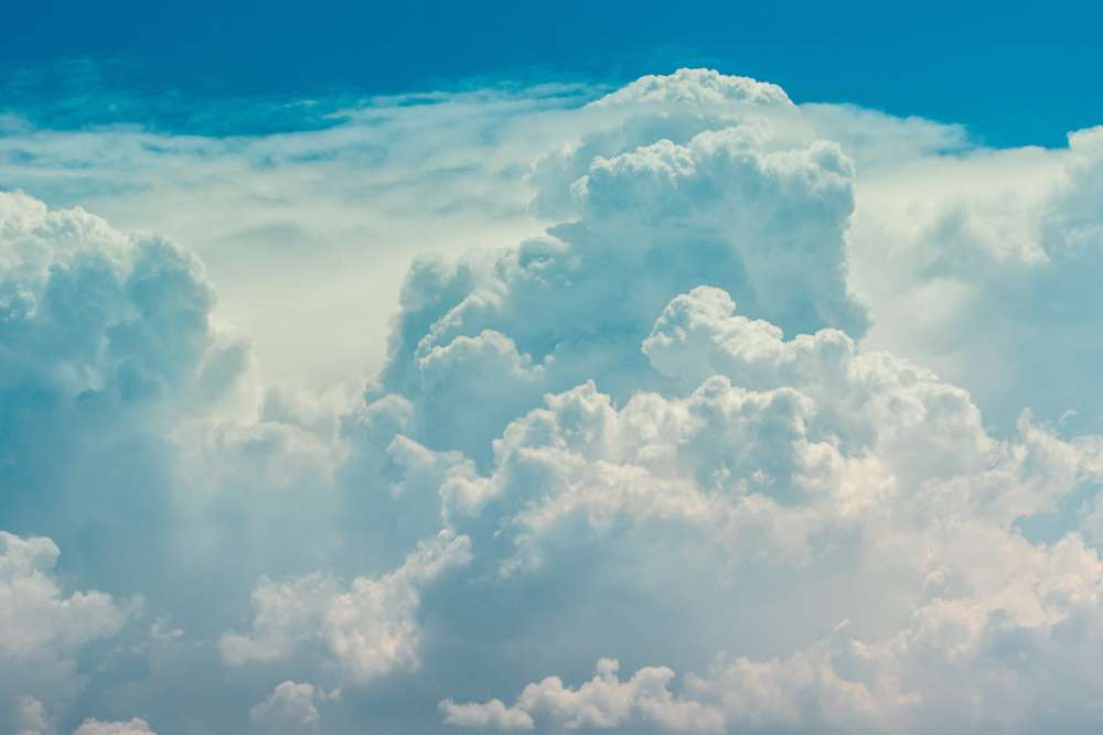 Partly cloudy today with possibility of some showers