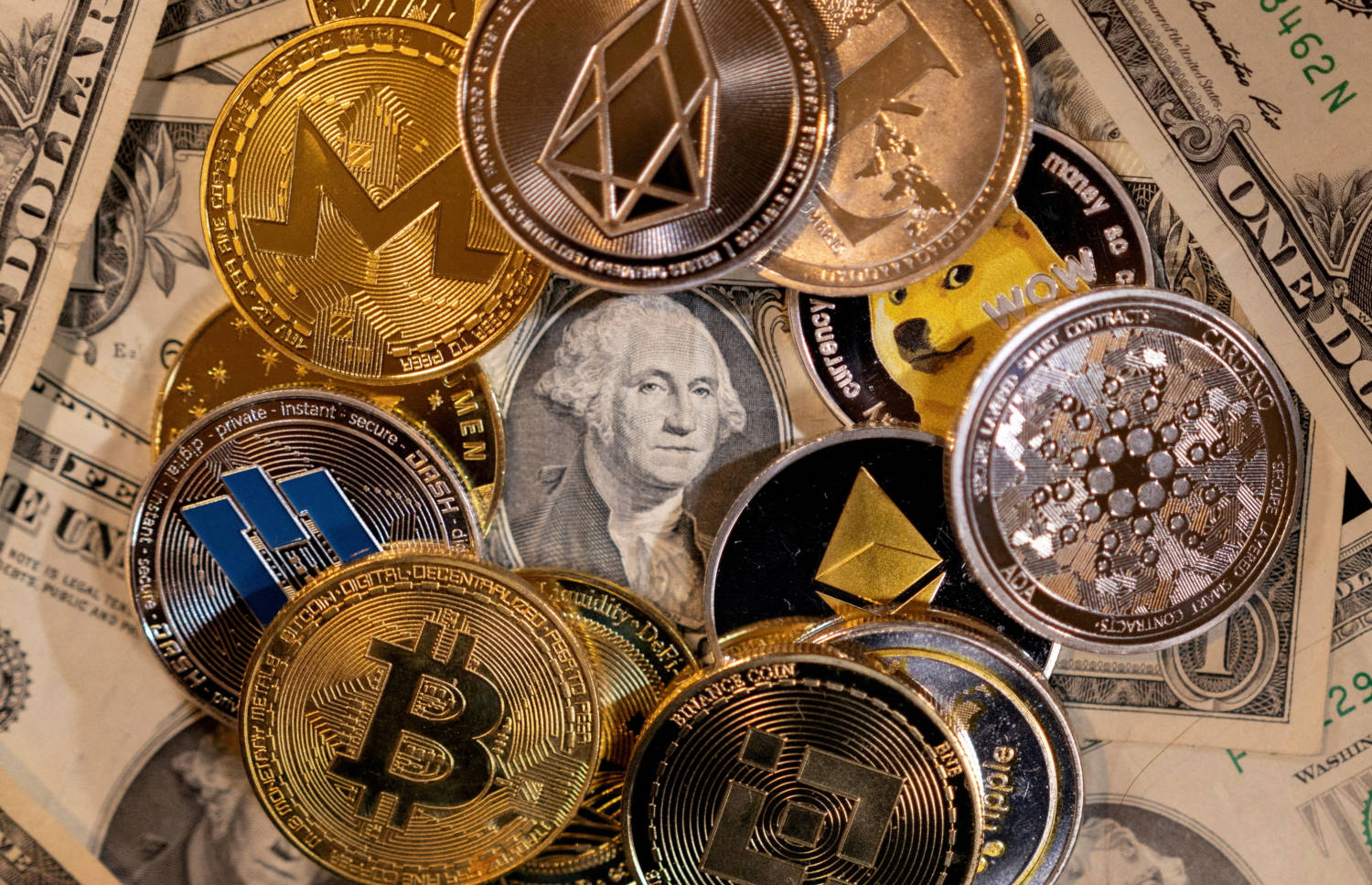 File Photo: Illustration Shows Representations Of Virtual Cryptocurrencies On U.s. Dollar Banknotes