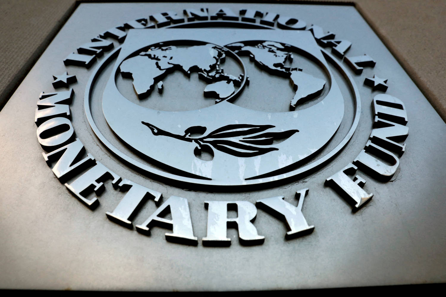 File Photo: The Imf Logo Is Seen Outside The Headquarters Building In Washington