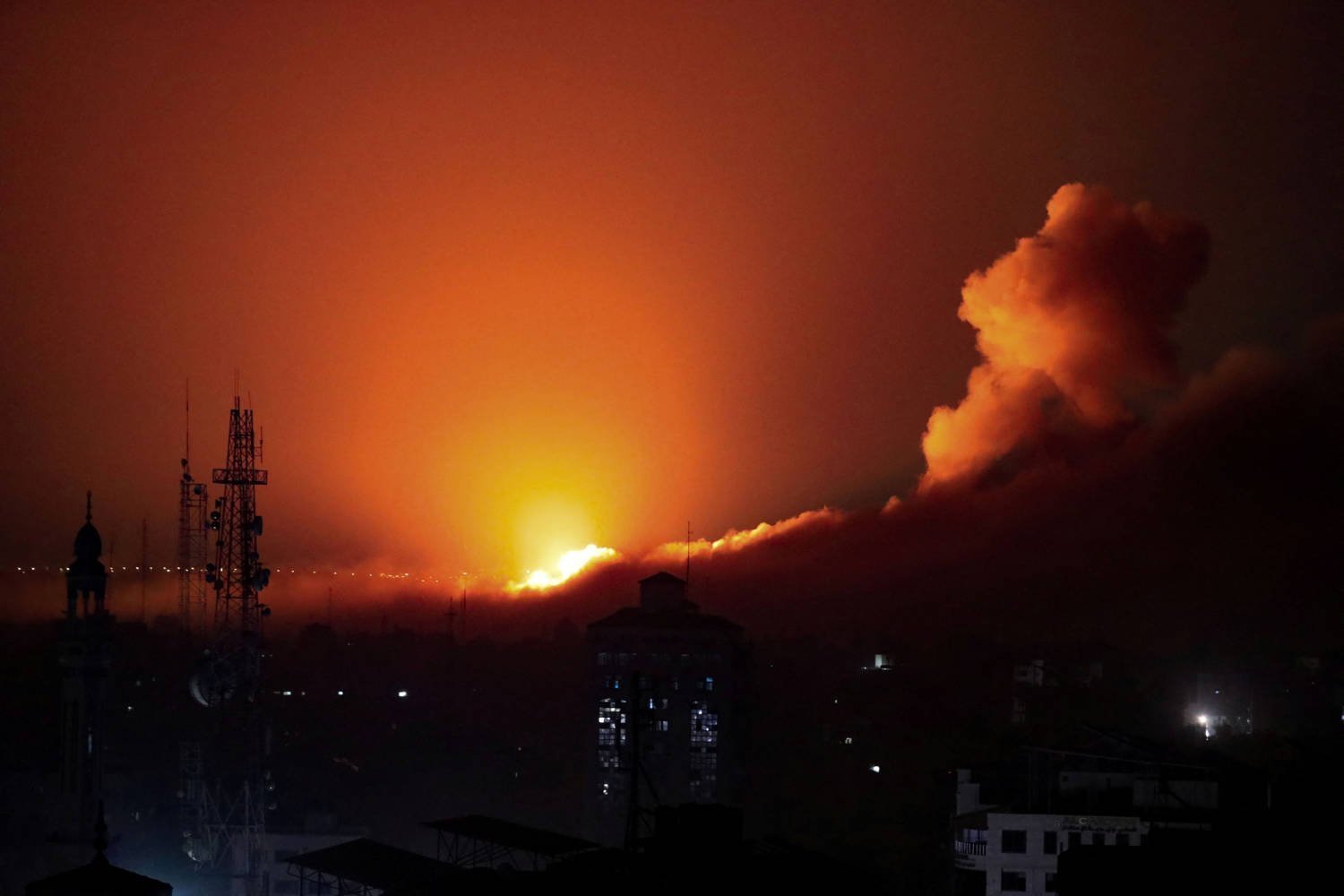 Smoke And Flames Rise During An Israeli Air Strike On West Gaza