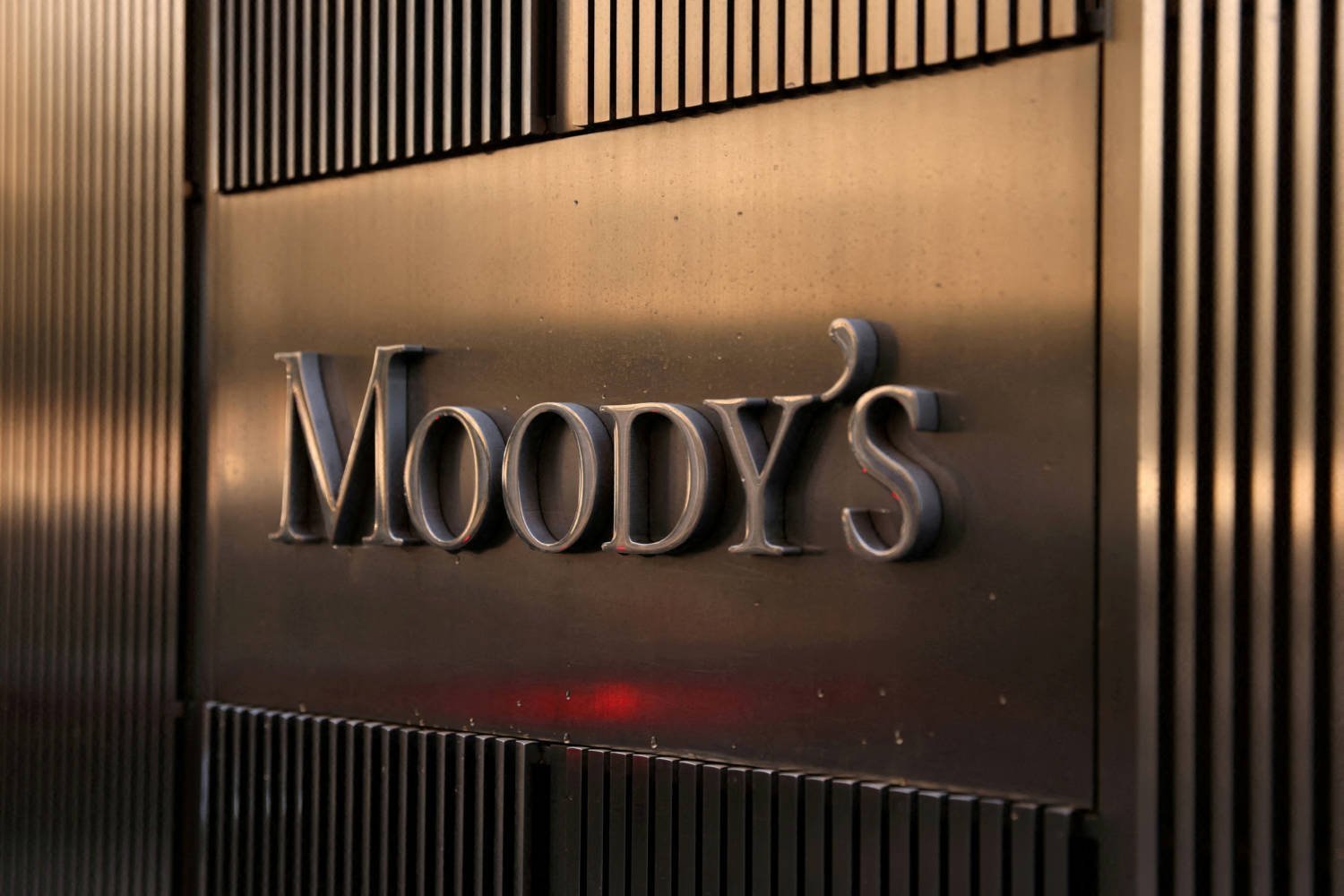 File Photo: Signage Is Seen Outside The Moody's Corporation Headquarters In Manhattan, New York