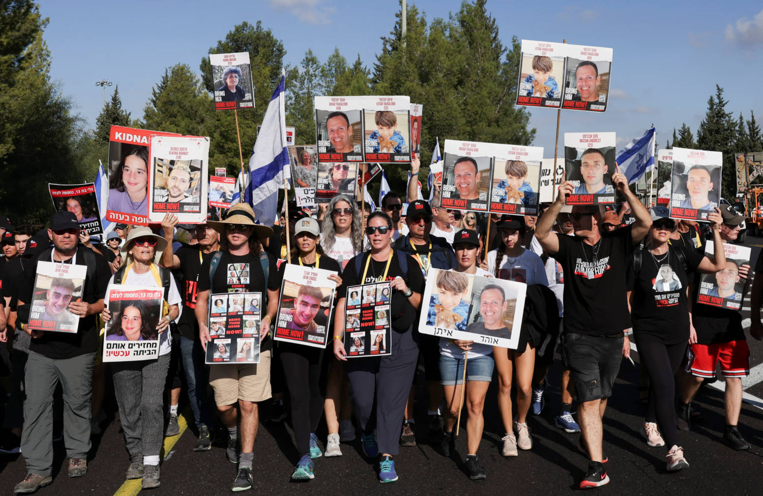 Family Members, Friends And Supporters Of Israelis And Other Nationalities Who Were Taken Hostage On October 7 By Palestinian Islamist Group Hamas Gunmen During A Deadly Attack, March Towards Jerusalem, In Latrun