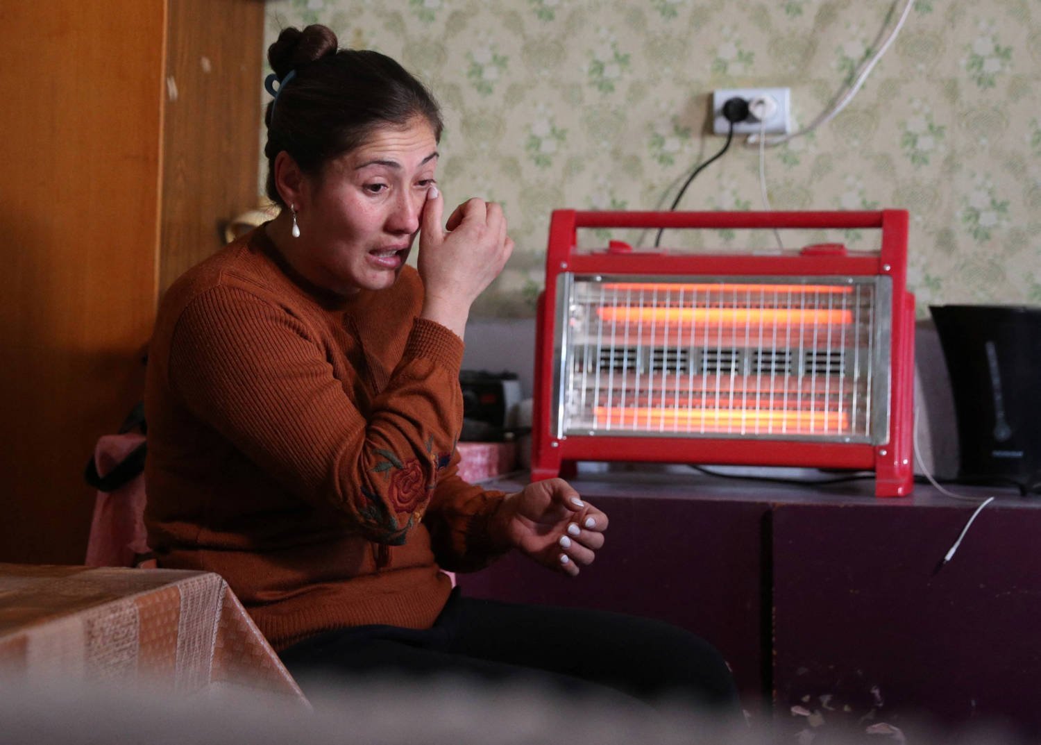 Refugee From Nagorno Karbakh Region Alina Harutyunyan Reacts As She Speaks To Journalists In The Disused Library Where She Lives In Masis
