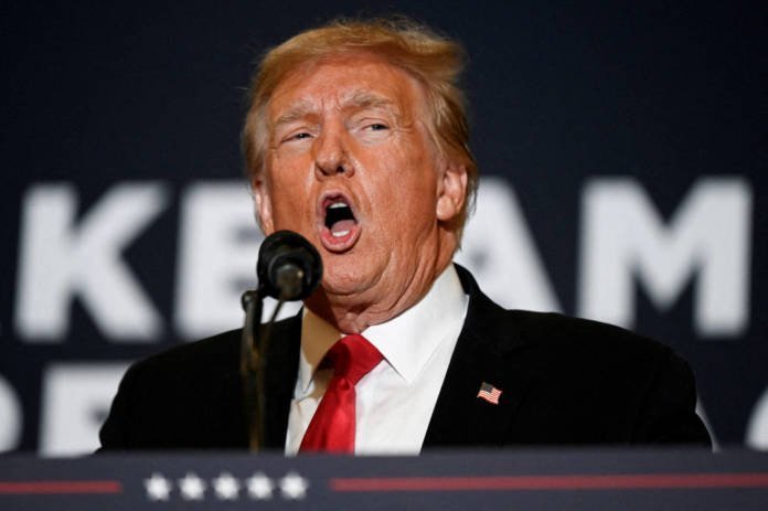 File Photo: Former U.s. President And Republican Presidential Candidate Donald Trump Attends A "commit To Caucus" Event For His Supporters In Coralville