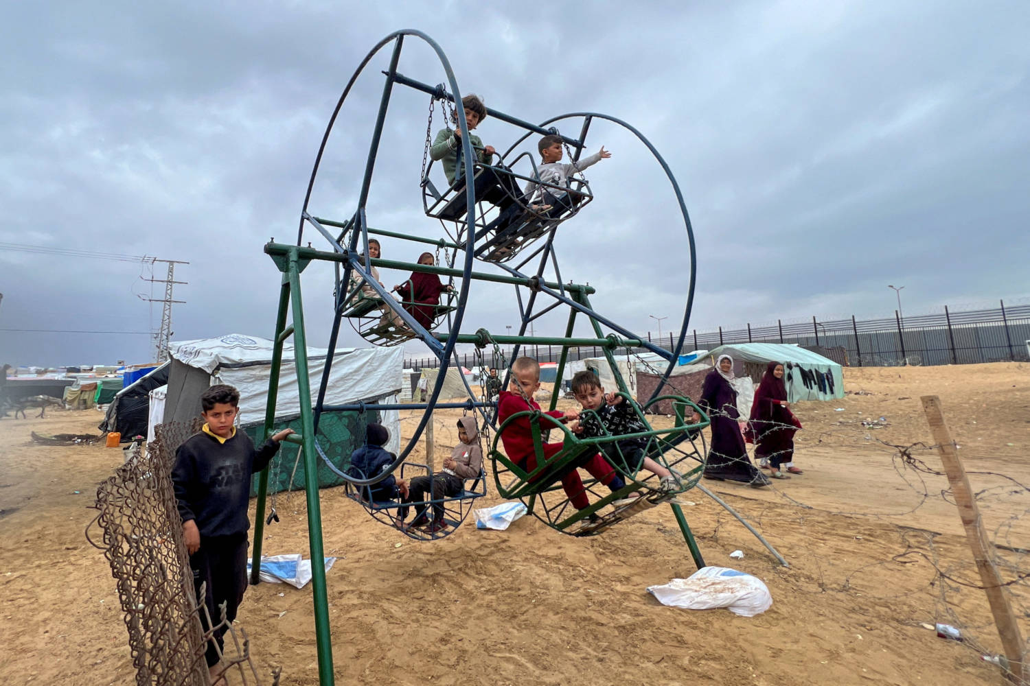Displaced Palestinians Shelter At A Tent Camp At The Border With Egypt, In Rafah In The Southern Gaza Strip