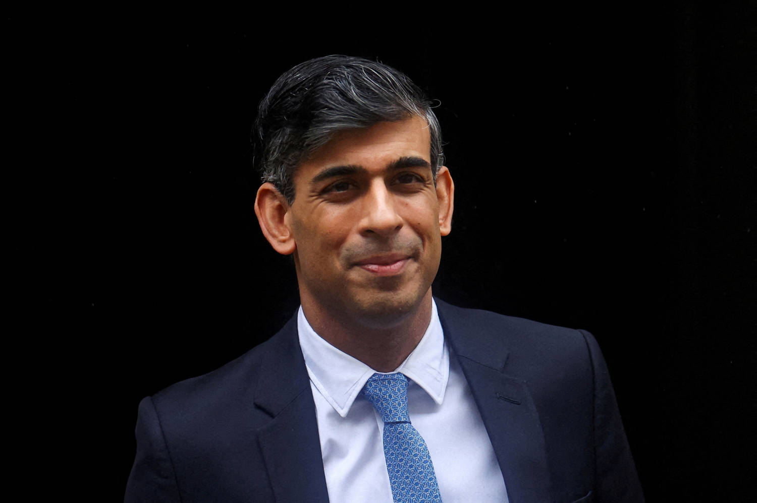 File Photo: British Prime Minister Rishi Sunak Walks Outside Number 10 Downing Street, In London