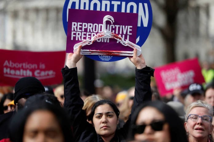 Demonstrators Rally Outside The U.s. Supreme Court In Washington