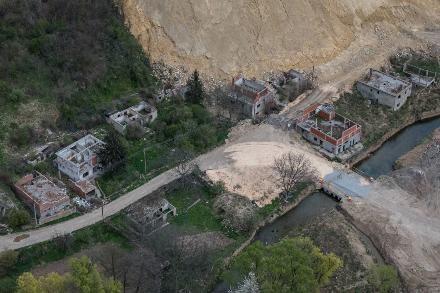 The Wider Image: In Serbian Village, Women Fight To Escape Encroaching Mine