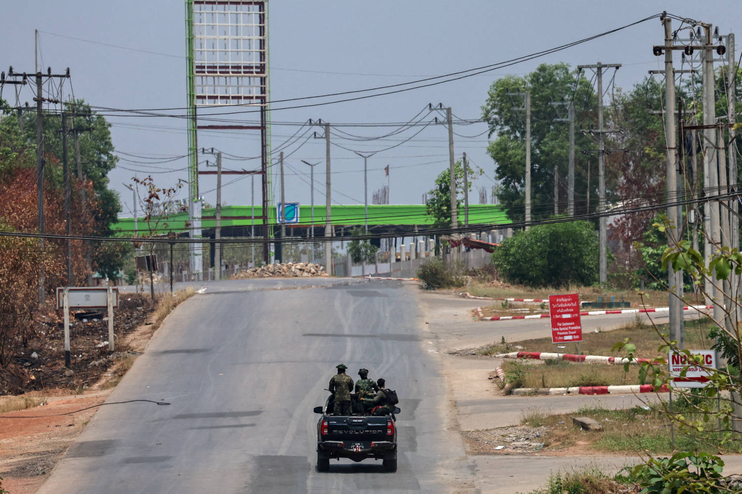 File Photo: Soldiers From The Karen National Liberation Army (knla) Patrol On A Vehicle, Next To An Area Destroyed By Myanmar's Airstrike In Myawaddy