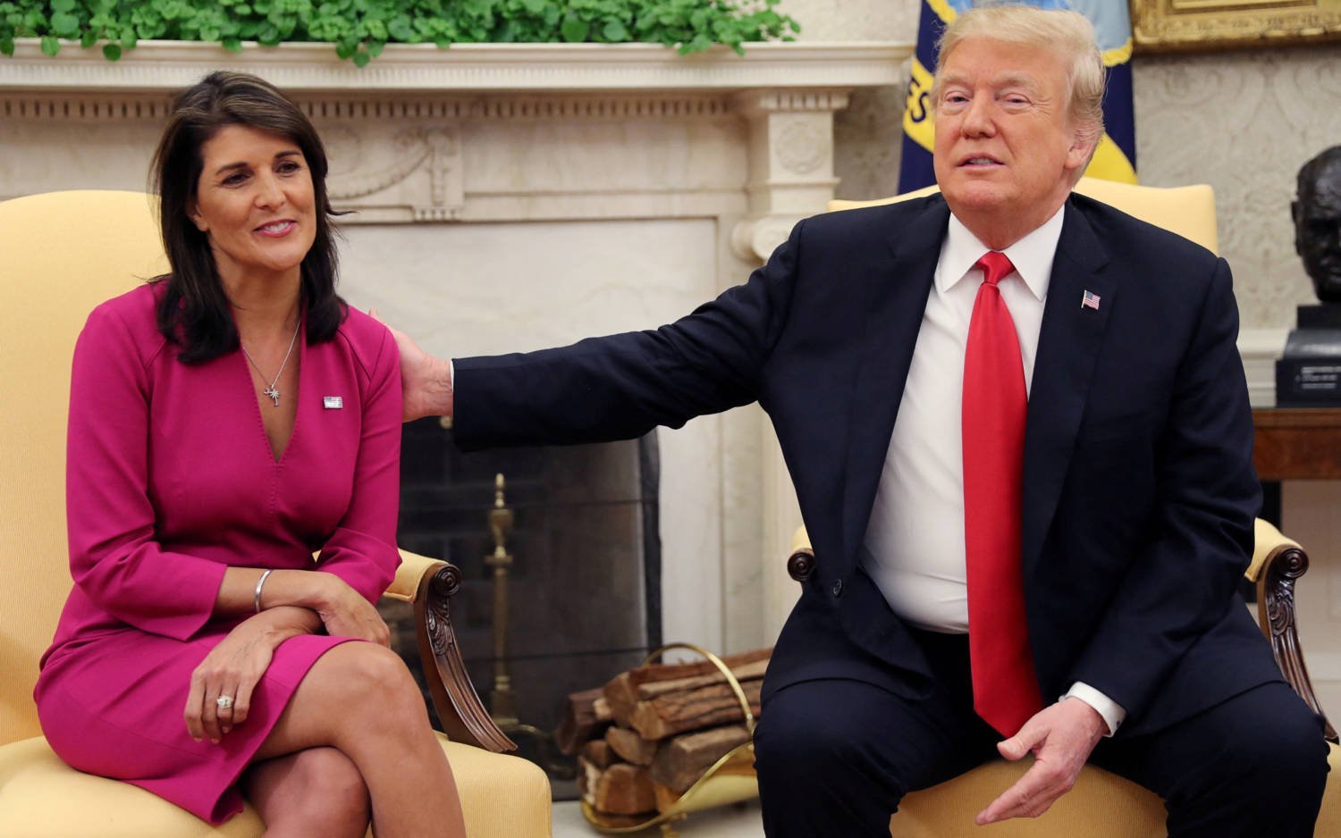 File Photo: U.s. President Trump Reaches Out To Uutgoing U.s. Ambassador To The U.n. Haley As They Meet In The Oval Office Of The White House In Washington
