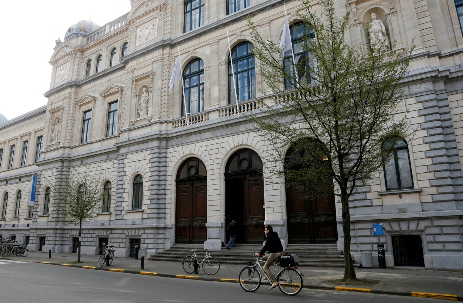 File Photo: A Cyclist Rides Past A Building Of Ghent University