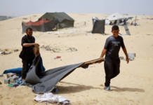 Palestinians Flee Rafah Following A Nearby Israeli Strike On An Area Designated For Displaced