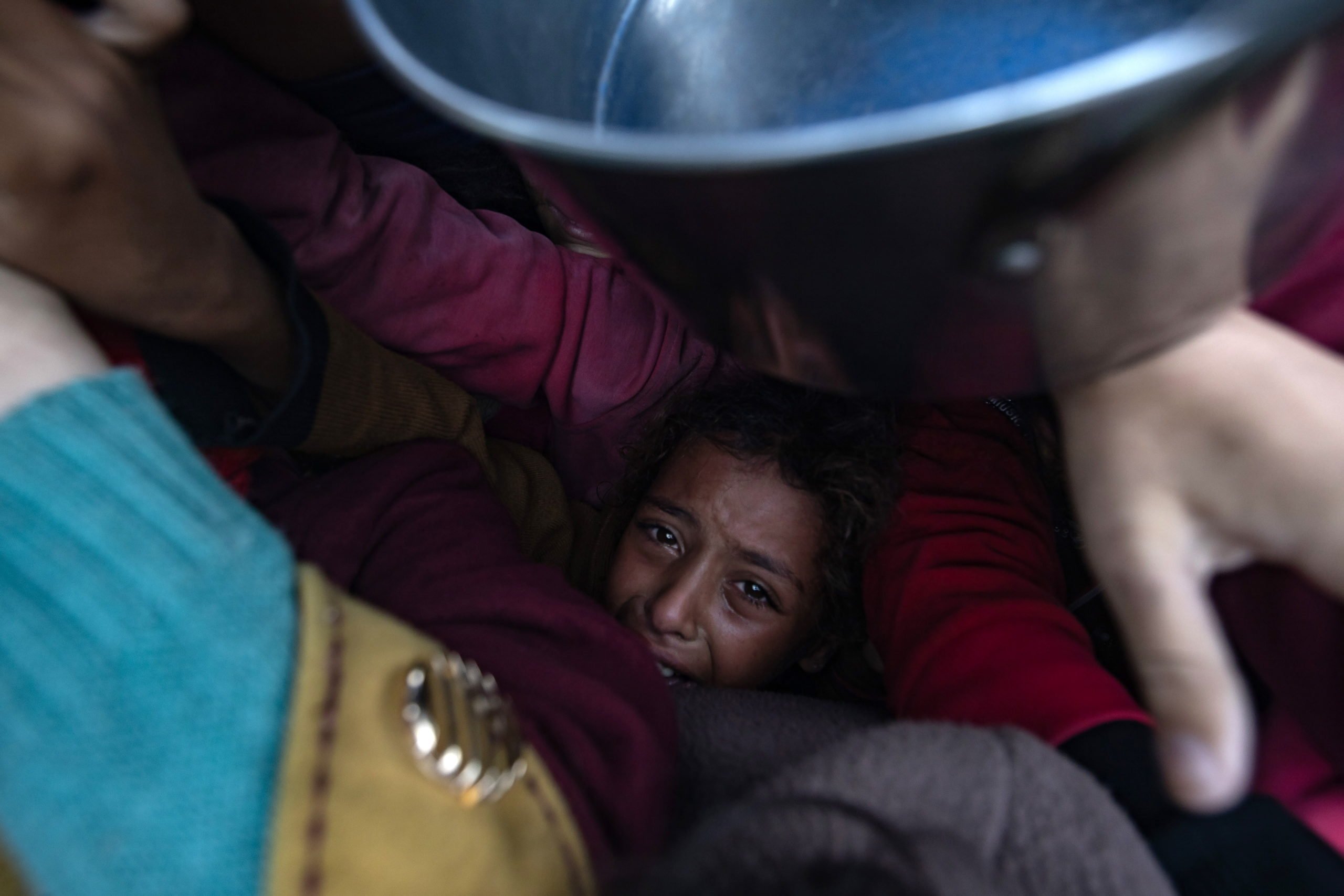 Displaced Palestinians Collect Donated Food In Khan Yunis, Southern Gaza