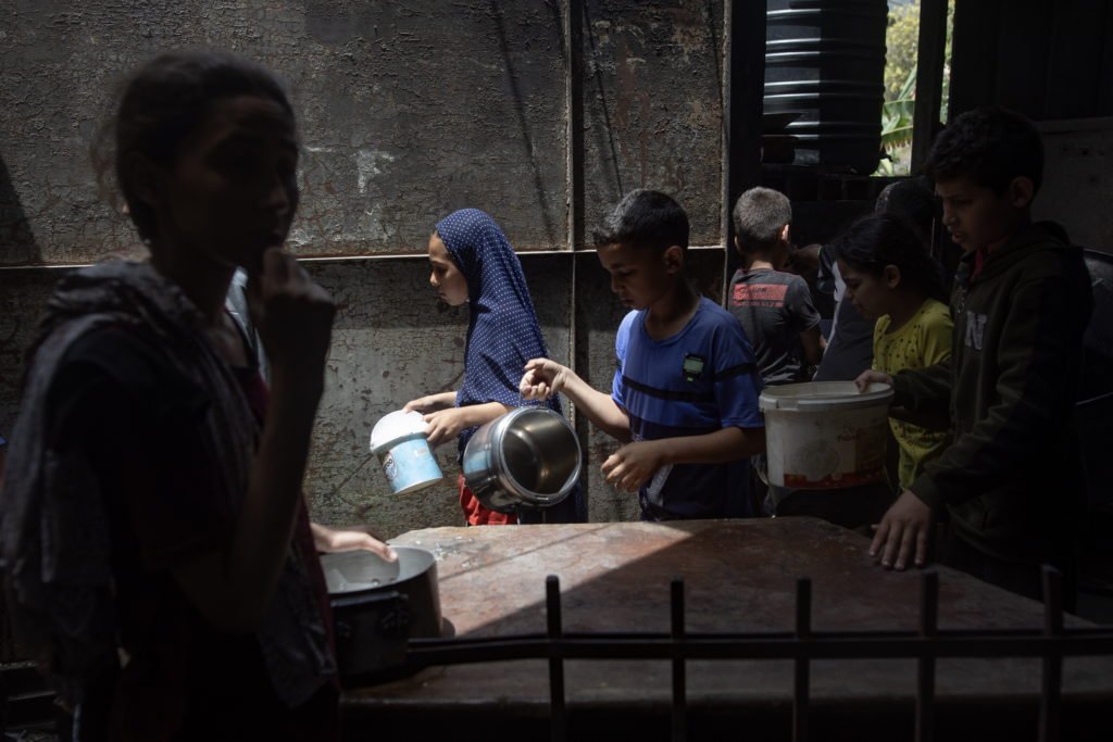 Hundreds Of Gazans Wait For Food At Charity Kitchen