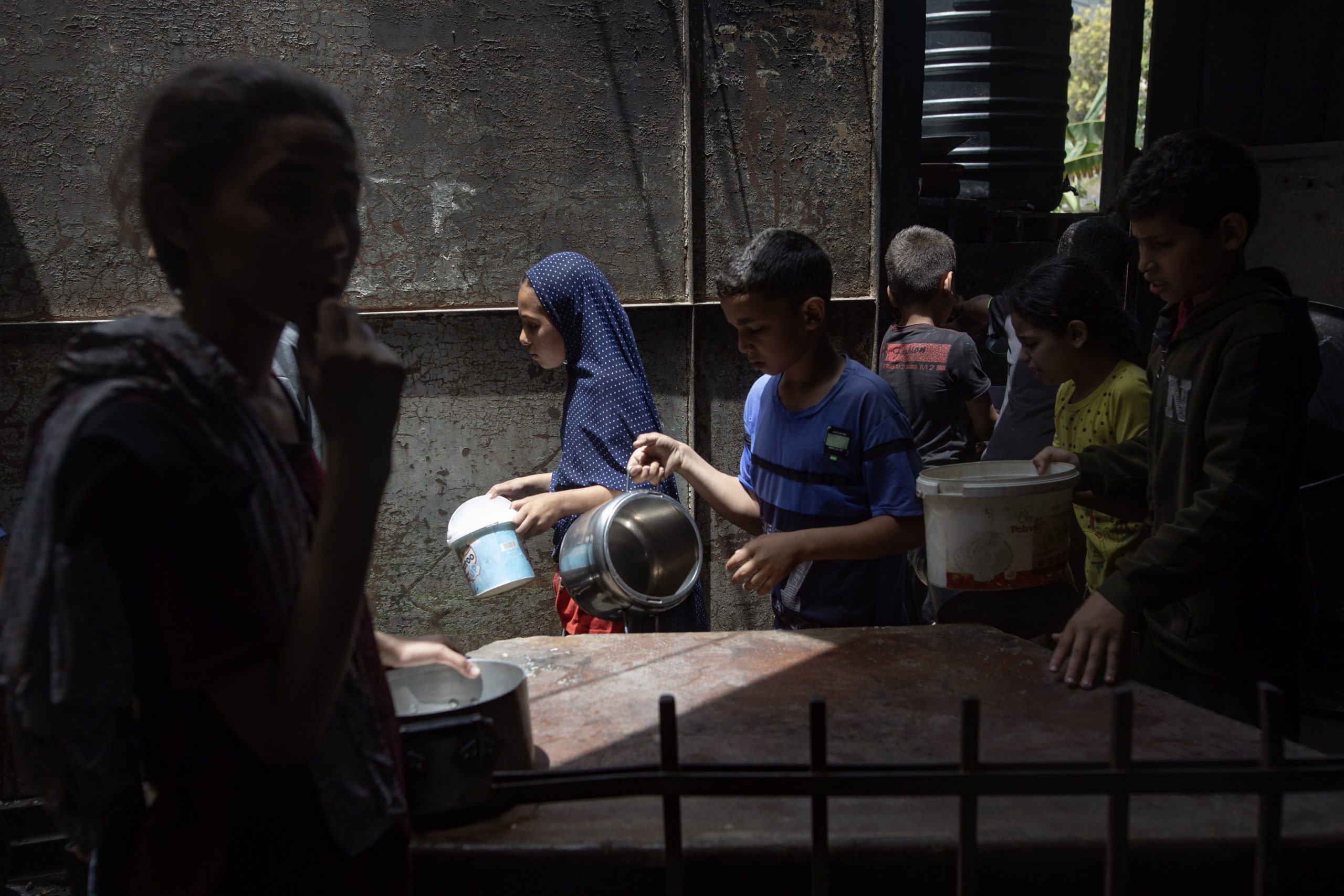Hundreds Of Gazans Wait For Food At Charity Kitchen