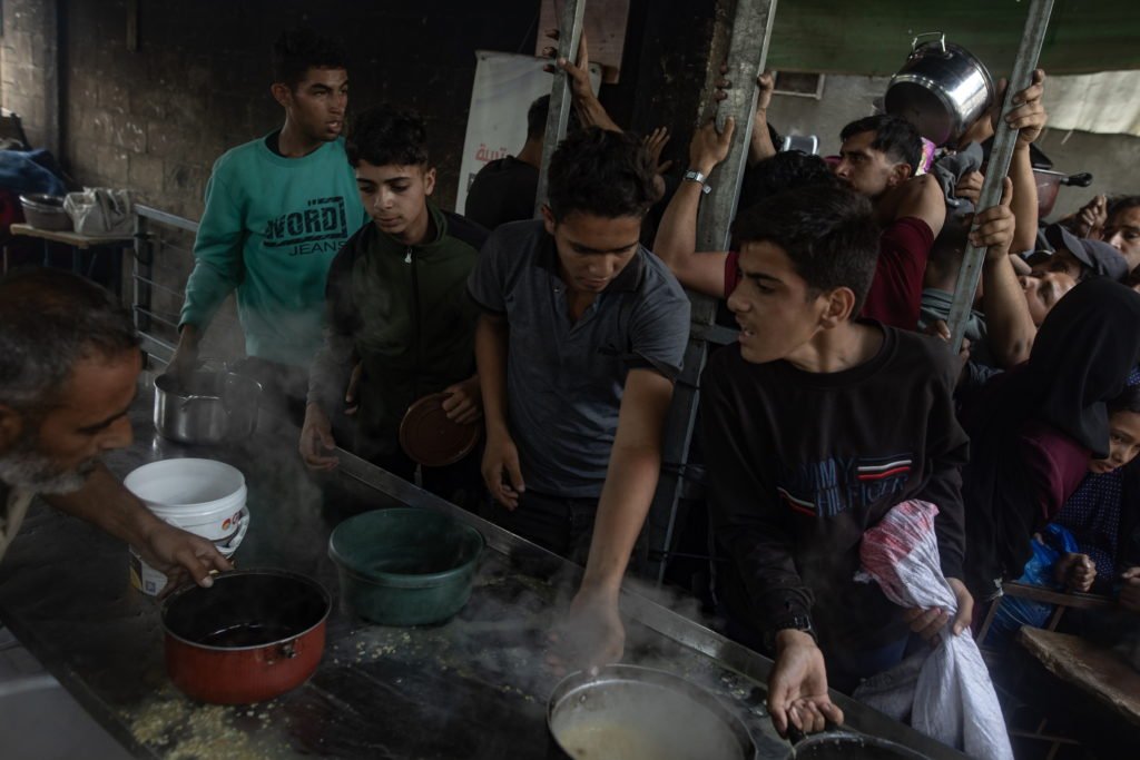 Hundreds Of Gazans Wait For Food At Charity Kitchen