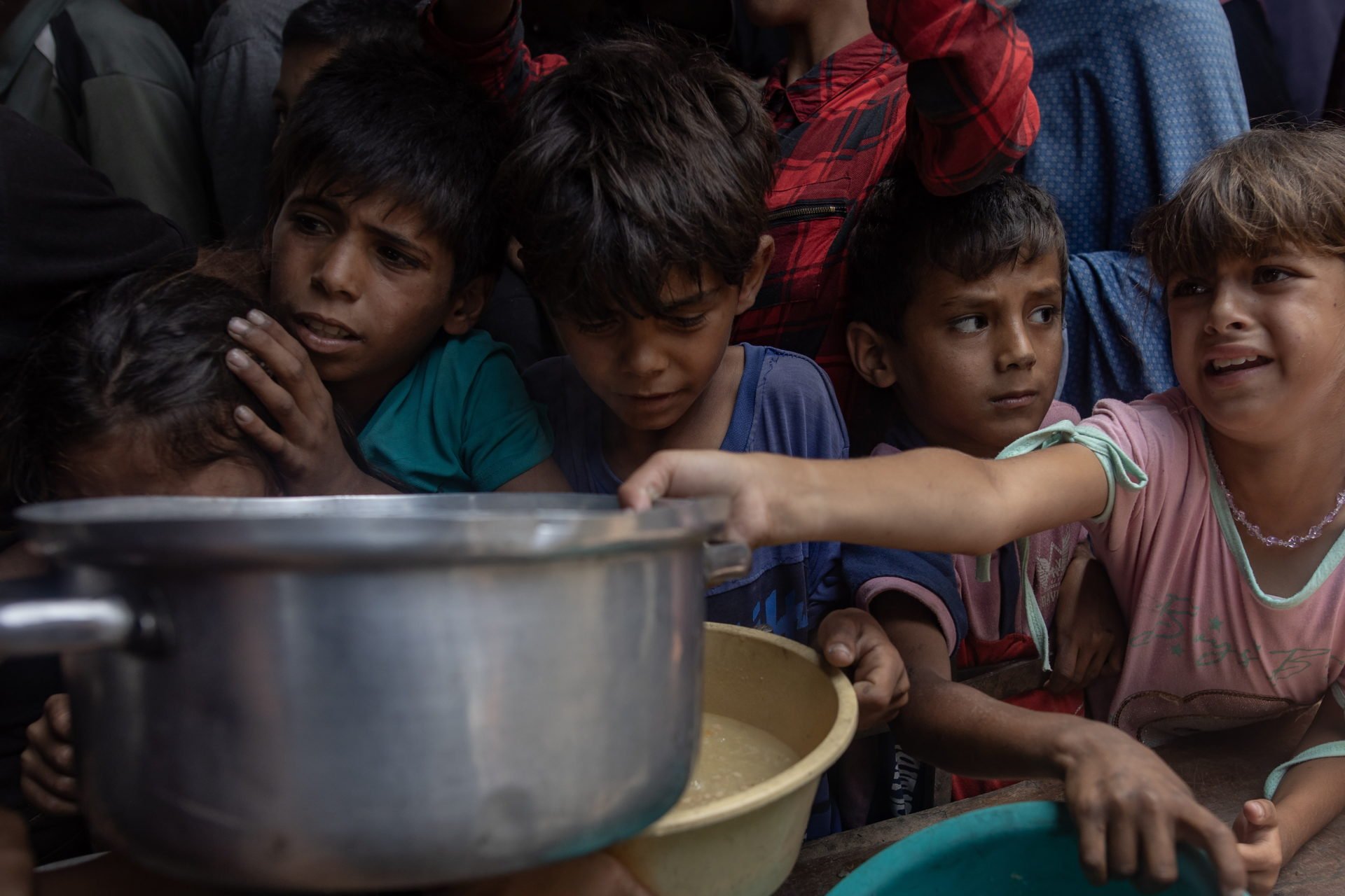 Hundreds Of Gazans Wait For Food At Charity Kitchen