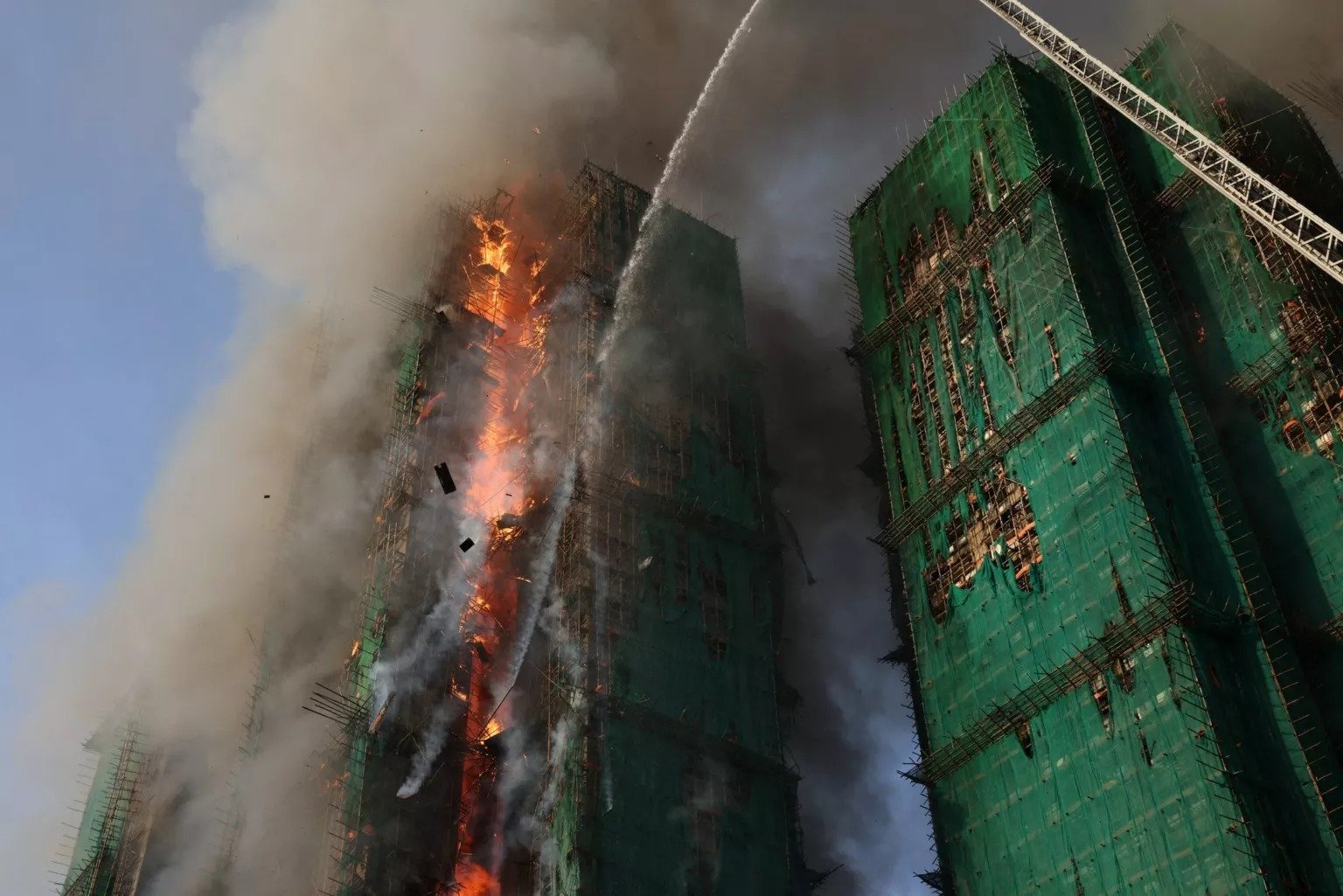 Four Dead As Fire Engulfs Hong Kong Skyscraper Towers