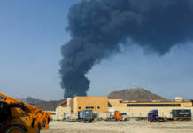 File Photo: Smoke Rises In The Fujairah Oil Industry Zone, Caused By Debris After Interception Of A Drone By Air Defenses, According To The Fujairah Media Office, Amid The U.s. Israel Conflict With Iran, In Fujairah