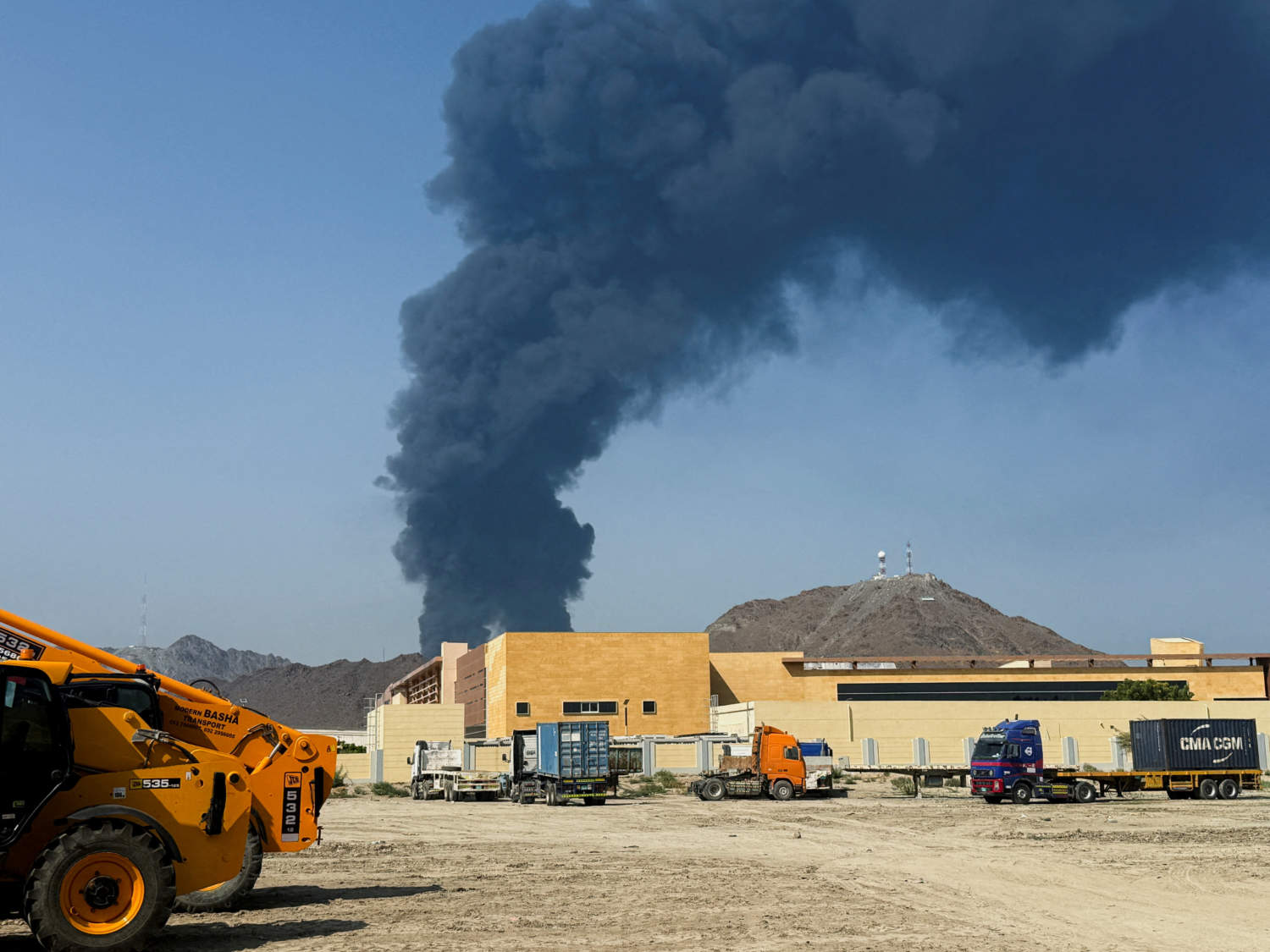 File Photo: Smoke Rises In The Fujairah Oil Industry Zone, Caused By Debris After Interception Of A Drone By Air Defenses, According To The Fujairah Media Office, Amid The U.s. Israel Conflict With Iran, In Fujairah