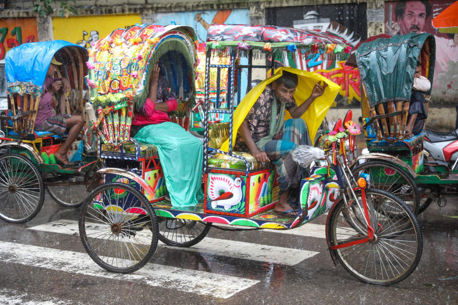 Rain Disrupts Daily Life In Dhaka City