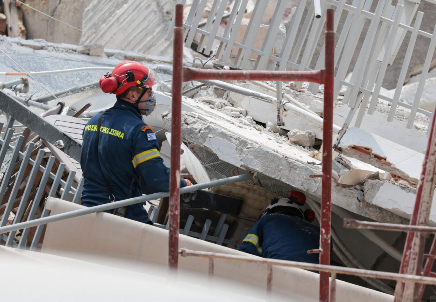 Emergency Personnel Work At The Site Of A Building Collapse In The Petralona Neighbourhood Of Athens
