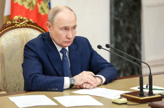 Russian President Vladimir Putin Chairs A Meeting On Measures To Support Relatives Of Those Killed And Injured In The Attack On A College In Starobelsk