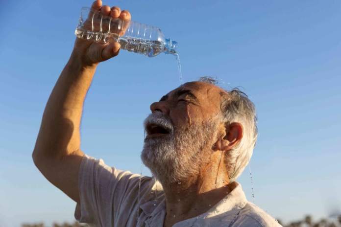 Old Man Struggling With High Temperature